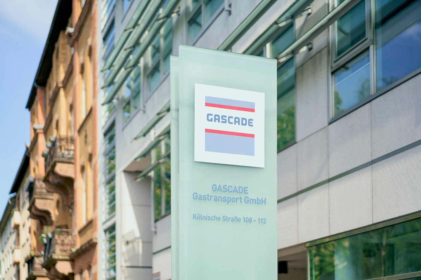 Company sign in front of the GASCADE headquarters (center)